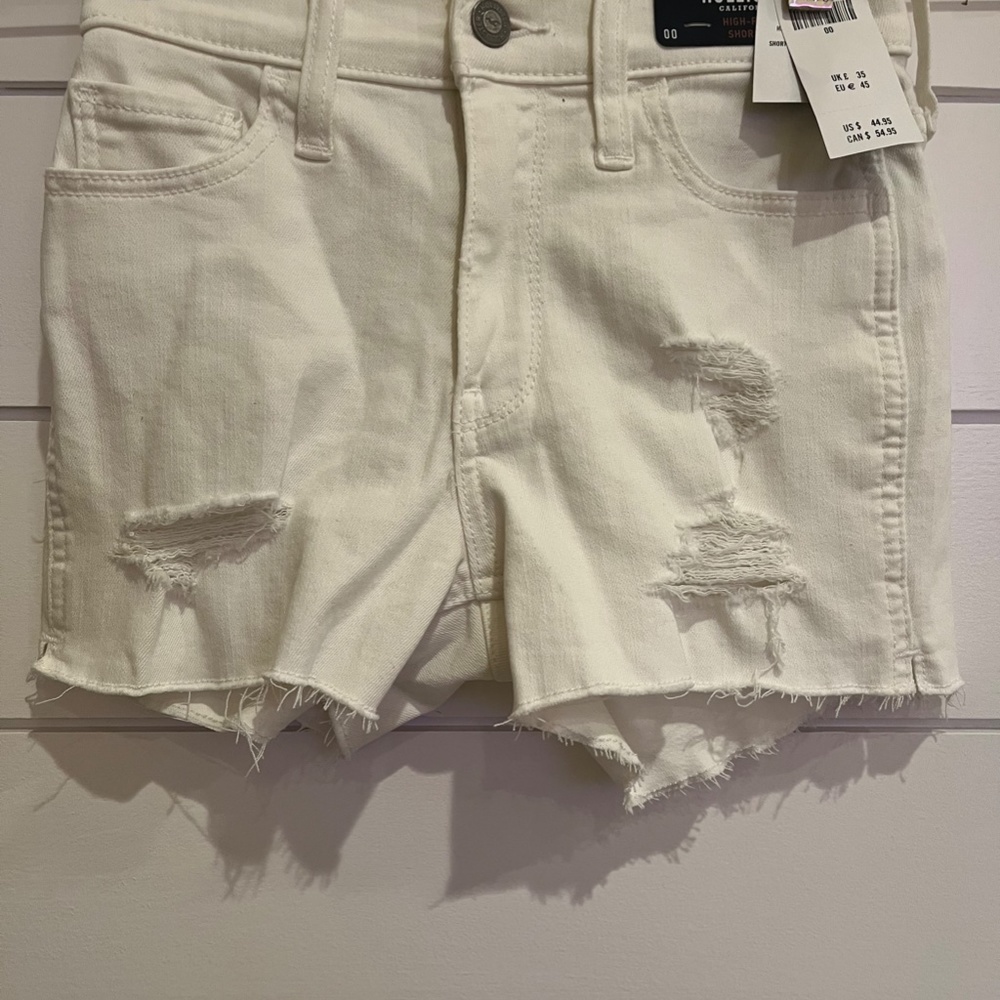 distressed white denim shorts